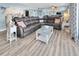 Spacious living area with beach-themed décor, comfortable seating, and plenty of natural light at 200 120Th W Ave # 3A, Treasure Island, FL 33706