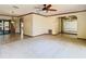 Bright living room featuring hardwood floors, and an archway leading to mirrored space at 2017 Godfrey Ave, Spring Hill, FL 34609