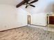 Bright living room featuring vaulted ceilings, a ceiling fan, and tile floors at 2017 Godfrey Ave, Spring Hill, FL 34609