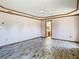 A bright main bedroom offers trey ceilings, tile floors, and plenty of natural light at 2017 Godfrey Ave, Spring Hill, FL 34609