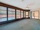 Large screened-in pool area with access to the pool, patio, and interior via sliding glass doors at 2017 Godfrey Ave, Spring Hill, FL 34609