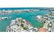 Stunning aerial view of waterfront property with boat docks and amazing ocean views, perfect for any boater at 234 Dolphin Pt # 1, Clearwater Beach, FL 33767