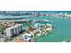 Wide aerial view of waterfront property with a clear water view at 234 Dolphin Pt # 1, Clearwater Beach, FL 33767