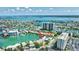 Breathtaking aerial view of home near open water with boat access at 234 Dolphin Pt # 1, Clearwater Beach, FL 33767