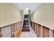 Unfinished hallway with an open staircase at 234 Dolphin Pt # 1, Clearwater Beach, FL 33767
