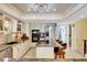 Spacious kitchen featuring granite counters, stainless steel appliances, and ample cabinet space at 234 Dolphin Pt # 1, Clearwater Beach, FL 33767