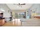 Spacious bedroom with waterfront views, desk space, and hardwood flooring at 234 Dolphin Pt # 1, Clearwater Beach, FL 33767
