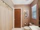 Bathroom with a shower and vanity that features decorative lighting and modern tile flooring at 2904 Pointer Pl, Seffner, FL 33584