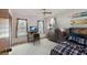 Bright bedroom with a desk, modern decor, and large window for natural light at 2904 Pointer Pl, Seffner, FL 33584