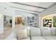 Bright living room featuring neutral colors, a bookshelf and a high ceiling with beams at 2904 Pointer Pl, Seffner, FL 33584
