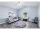 Cozy living room featuring vaulted ceilings, arched windows, and stylish decor at 321 Bahia Vista Dr, Indian Rocks Beach, FL 33785