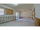 Open kitchen area with sliding glass door, ceiling fan and potential for customization at 39696 Meadowood Loop, Zephyrhills, FL 33542