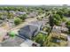 A high angle view shows the backyard, screened in lanai, and neighborhood at 4007 W Gray St, Tampa, FL 33609