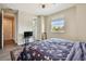 Bedroom with neutral walls, and wood floors, great natural light and an entrance to the bathroom at 4007 W Gray St, Tampa, FL 33609