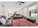 Bright living room featuring comfortable leather sofas and an oriental rug at 4007 W Gray St, Tampa, FL 33609