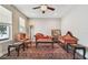 Elegant living room boasts hardwood floors and multiple windows at 4007 W Gray St, Tampa, FL 33609