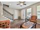 Elegant living room boasts hardwood floors, a staircase, and a front-facing window at 4007 W Gray St, Tampa, FL 33609