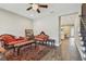 Elegant living room boasts hardwood floors, a ceiling fan, and an open floorplan at 4007 W Gray St, Tampa, FL 33609
