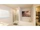 Bathroom featuring a tub, separate shower, granite counters, and a linen closet at 4444 Boyer Ter, North Port, FL 34288