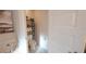 Toilet room with modern fixtures, decorative shelving, and stylish tile flooring at 4444 Boyer Ter, North Port, FL 34288