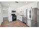 Modern kitchen featuring stainless steel appliances, sleek countertops, and ample cabinet space at 4701 14Th S Ave, St Petersburg, FL 33711