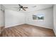 Bright, open floor plan featuring new flooring, ceiling fan, and a view to the outside at 4701 14Th S Ave, St Petersburg, FL 33711