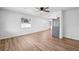 Bright, open floor plan featuring new flooring with access to kitchen and other rooms at 4701 14Th S Ave, St Petersburg, FL 33711
