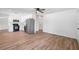 Bright, open floor plan featuring new flooring and stainless steel appliances in kitchen at 4701 14Th S Ave, St Petersburg, FL 33711