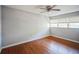 Bright bedroom with wood flooring and a window at 503 W Lee St, Plant City, FL 33563