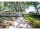Charming single-story home featuring light grey siding and a well-maintained front yard at 503 W Lee St, Plant City, FL 33563