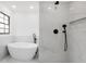 Stylish bathroom with a soaking tub and walk in shower at 7227 Otter Creek Dr, New Port Richey, FL 34655