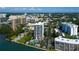 Scenic aerial view of condo near the bay, showcasing lush landscaping and city views at 80 Rogers St # 2A, Clearwater, FL 33756
