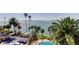 Wonderful aerial view showcasing tropical landscaping, a pool and water views at 80 Rogers St # 2A, Clearwater, FL 33756