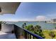 Enjoy picturesque waterfront views from this condo balcony overlooking the serene bay and distant cityscape at 80 Rogers St # 2A, Clearwater, FL 33756