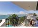Enjoy the stunning water view from this spacious balcony with seating at 80 Rogers St # 2A, Clearwater, FL 33756