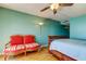 Bedroom with a red couch and a coastal view at 80 Rogers St # 2A, Clearwater, FL 33756