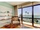 Bedroom sitting area with amazing water view through large windows at 80 Rogers St # 2A, Clearwater, FL 33756