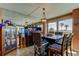 Inviting dining room boasts a large window with waterfront views and an elegant mirrored wall at 80 Rogers St # 2A, Clearwater, FL 33756