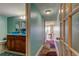 Hallway with an open view to the bathroom and sitting room at 80 Rogers St # 2A, Clearwater, FL 33756