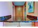 Kitchen counter featuring granite countertops and ample cabinet space at 80 Rogers St # 2A, Clearwater, FL 33756
