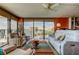 Bright and airy living room featuring large windows with beautiful bay views at 80 Rogers St # 2A, Clearwater, FL 33756
