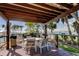 Entertain guests on the covered outdoor deck with a grill, dining table, and stunning waterfront views at 80 Rogers St # 2A, Clearwater, FL 33756