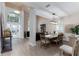Inviting interior featuring an open floor plan, designer lighting, and ample natural light at 9980 Sago Point Dr, Seminole, FL 33777