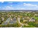 Aerial view of Bardmoor Golf & Tennis Club showing the golf course and tennis courts in a picturesque setting at 1002 Cordova Grn, Seminole, FL 33777