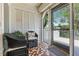Inviting patio with comfortable seating and peaceful views of landscaped greenery at 1002 Cordova Grn, Seminole, FL 33777