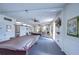Bright billiard room featuring two pool tables, comfortable seating, and a relaxing atmosphere for entertainment at 10190 Imperial Point W Dr # 8, Largo, FL 33774