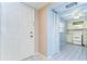 Welcoming foyer featuring a front door and an adjacent closet, leading into the kitchen at 10190 Imperial Point W Dr # 8, Largo, FL 33774