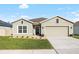 Inviting single-Gathering home with a well-kept lawn, a two-car garage and a welcoming entrance at 10196 Cross Timber Ter, Land O Lakes, FL 34638