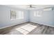 Bright bedroom with natural light, with wood-look flooring and a ceiling fan at 1225 26Th N St, St Petersburg, FL 33713