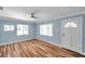 Inviting living room with hardwood floors, natural light, and a ceiling fan at 1225 26Th N St, St Petersburg, FL 33713